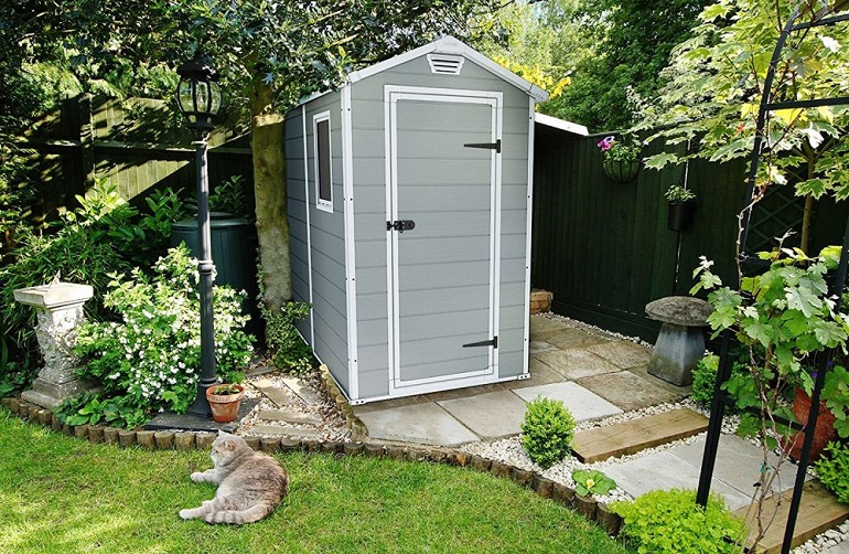 narrow storage shed in garden