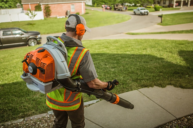 working with backpack leaf blower